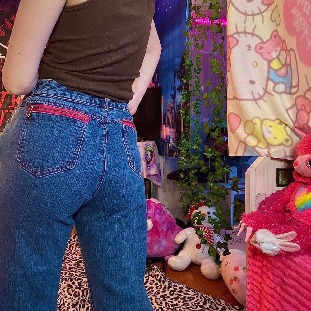 MK jeans with pink details